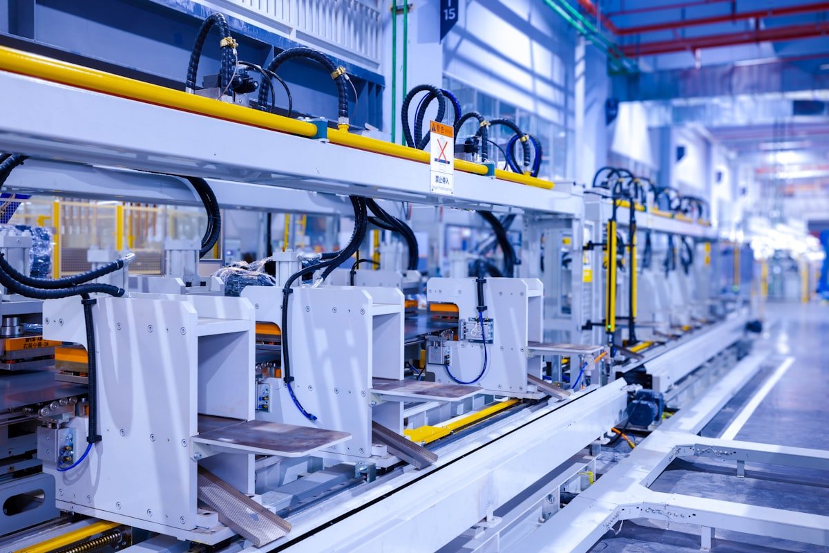 Modern automated production line machinery in a factory facility.