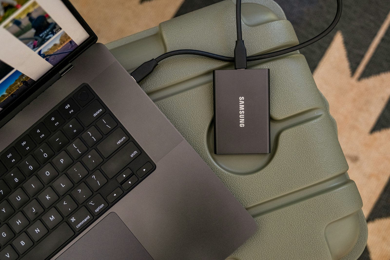 Laptop and external hard drive set up for deleted file recovery and restore work.